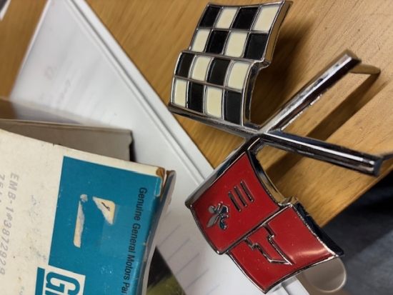 65-66 front Nose Emblem - NOS Crossed Flags Maroon