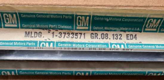 1956-57 LH Rear Lower Cove Trim - NOS #3733571