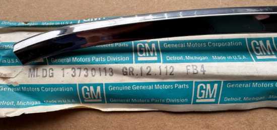 1956-57 LH Lower Door Cove Trim - NOS #3730113